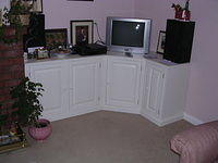 Fitted corner T.V  cabinet